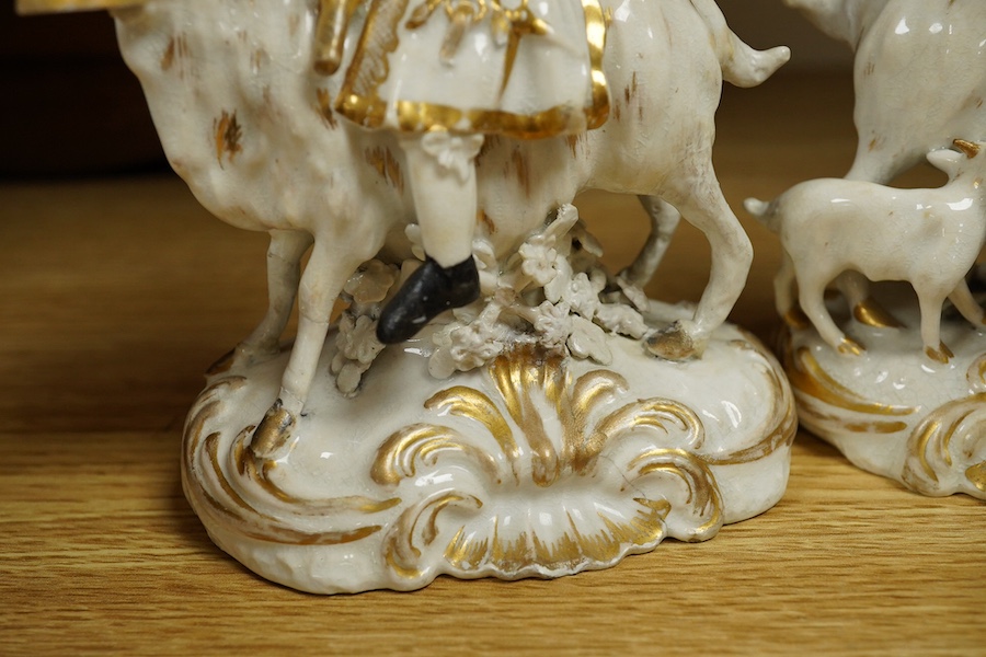 A pair of Bloor Derby white and gilt porcelain figures, Tailor and his Wife, together with a pair of small Imari pattern campaign spill vases, largest 14cm high. Condition - some restoration